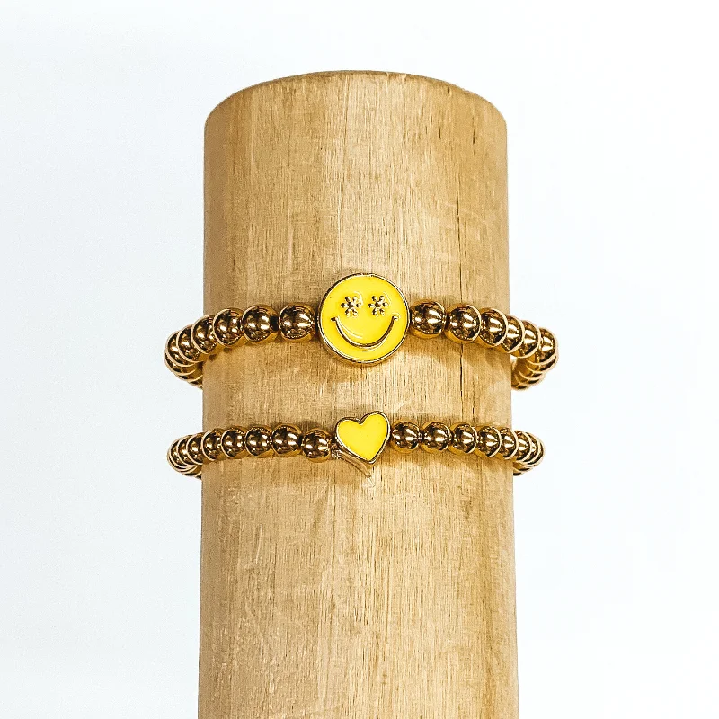 women’s pearl bangles-Set of Two | Gold Beaded Bracelets with Heart and Happy Face Pendant in Yellow