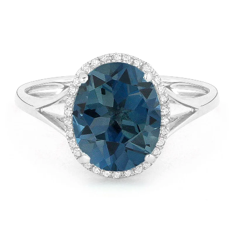 sterling silver rings for ladies-WHITE GOLD FASHION RING WITH OVAL CUT LONDON BLUE TOPAZ, .10 CT TW