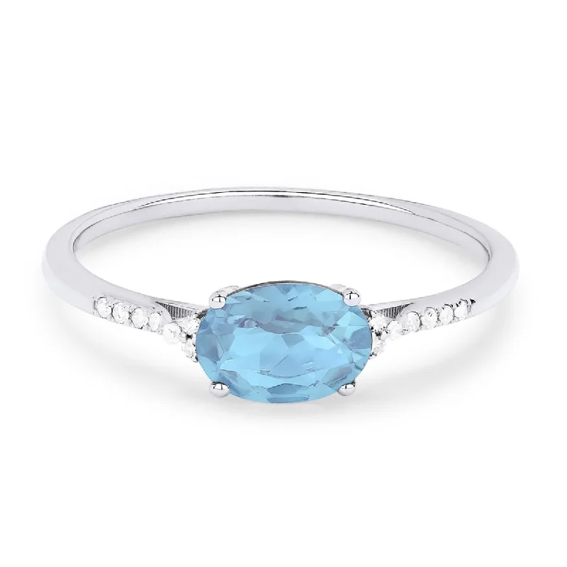 luxury gemstone ladies rings-OVAL CUT BLUE TOPAZ AND DIAMOND RING, .04 CT TW