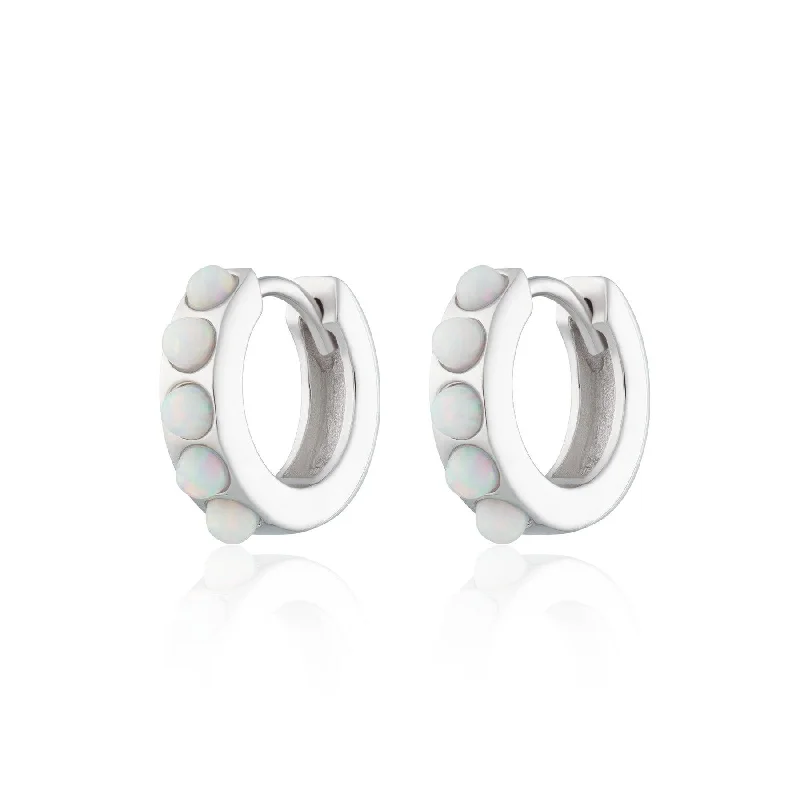 women’s trendy statement earrings-Scream Pretty Huggie Earrings with White Opal Stones