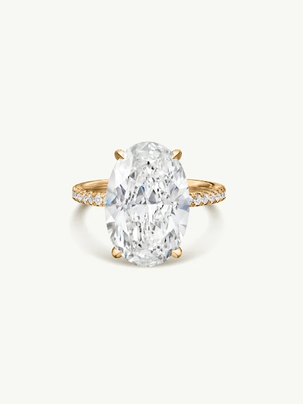 affordable princess-cut engagement rings for women-Suma Oval-Shaped Brilliant Cut White Diamond Engagement Ring In 18K Yellow Gold