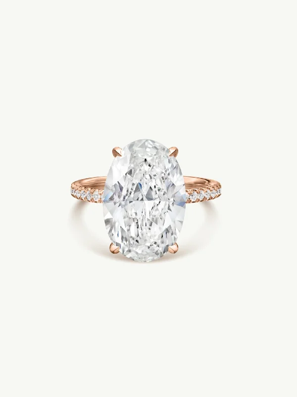 round diamond engagement rings-Suma Oval-Shaped Brilliant Cut White Diamond Engagement Ring In 18K Rose Gold