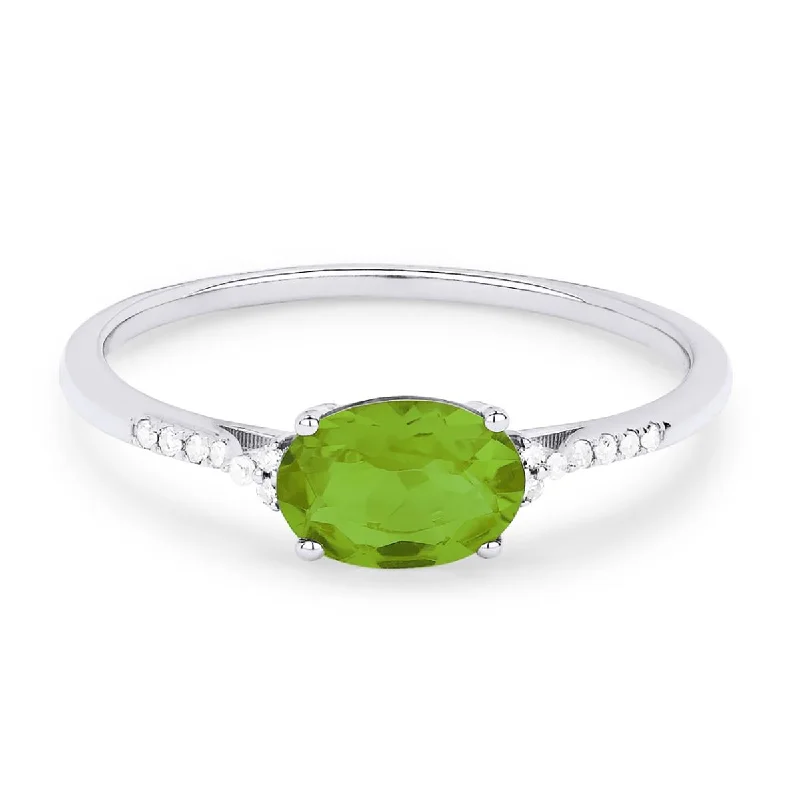 boho style ladies rings-OVAL CUT PERIDOT AND DIAMOND RING, .04 CT TW