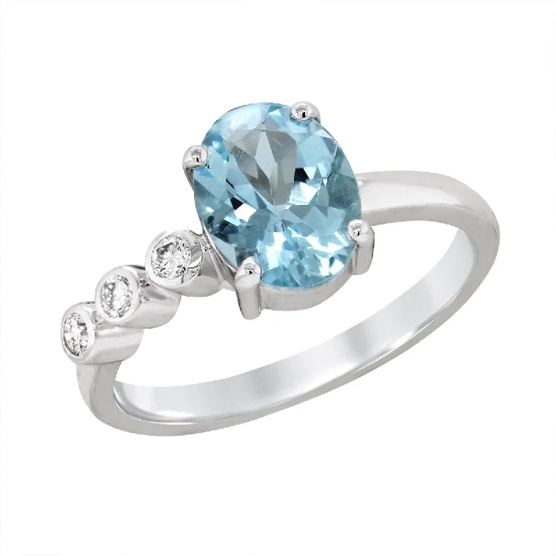 women’s birthstone rings-WHITE GOLD OVAL AQUAMARINE RING WITH SIDE DIAMONDS, .09 CT TW